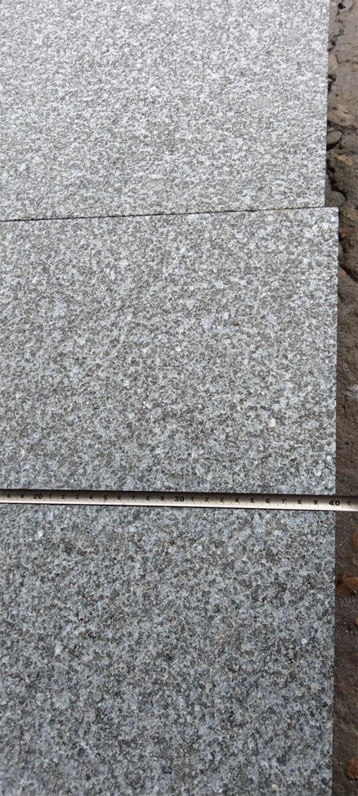 G654 Dark Grey Granite Flamed Tiles close-up