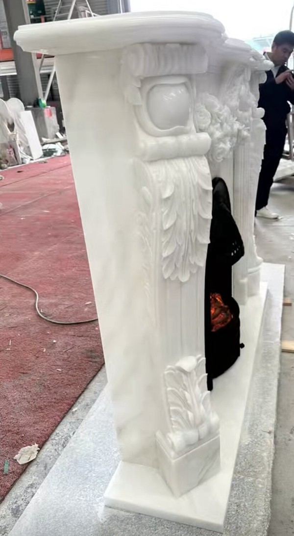 polished white marble fireplace